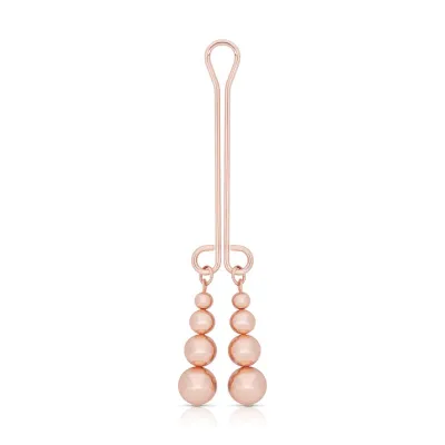Rosy Gold - Pince Clitoris - Poids SubtilD&eacute;couvrez une stimulation raffin&eacute;e avec cette pince pour clitoris, con&ccedil;ue pour celles et ceux qui recherchent des sensations ci
