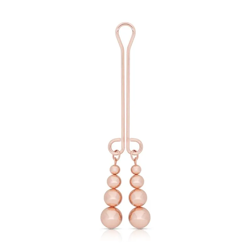 Rosy Gold - Pince Clitoris - Poids SubtilDécouvrez une stimulation raffinée avec cette pince pour clitoris, conçue pour celles et ceux qui recherchent des sensations ci